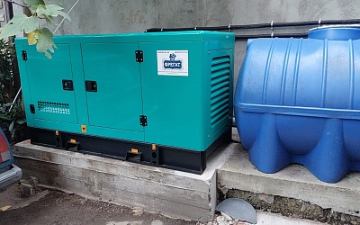 Дизельный генератор 50 кВт в кожухе для частного дома
